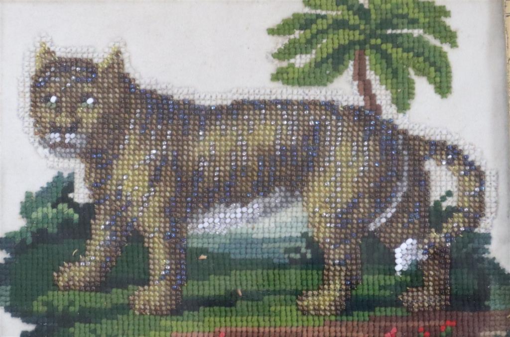 A Victorian needlework panel of a lion